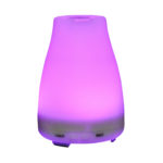 a portable aroma diffuser with purple LED light