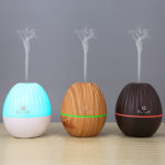 3 usb portable humidifiers with 3 colors are running with mist