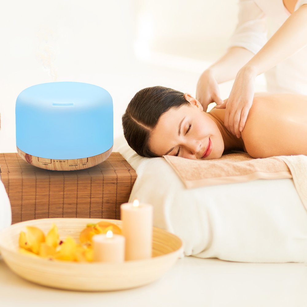 a woman is under spa with muji oil diffuser running aside