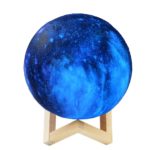 a galaxy sky light with wood stand