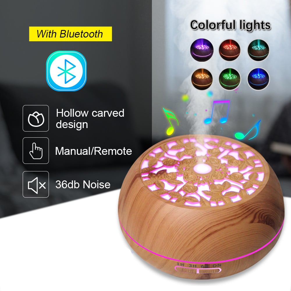 a wood color essential oil diffuser with bluetooth music playing