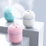 3 small humidifiers for office are working on the desktop