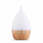 a wood base and white cover usb aroma diffuser