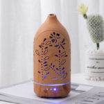 a light wood color aroma diffuser with LED light on